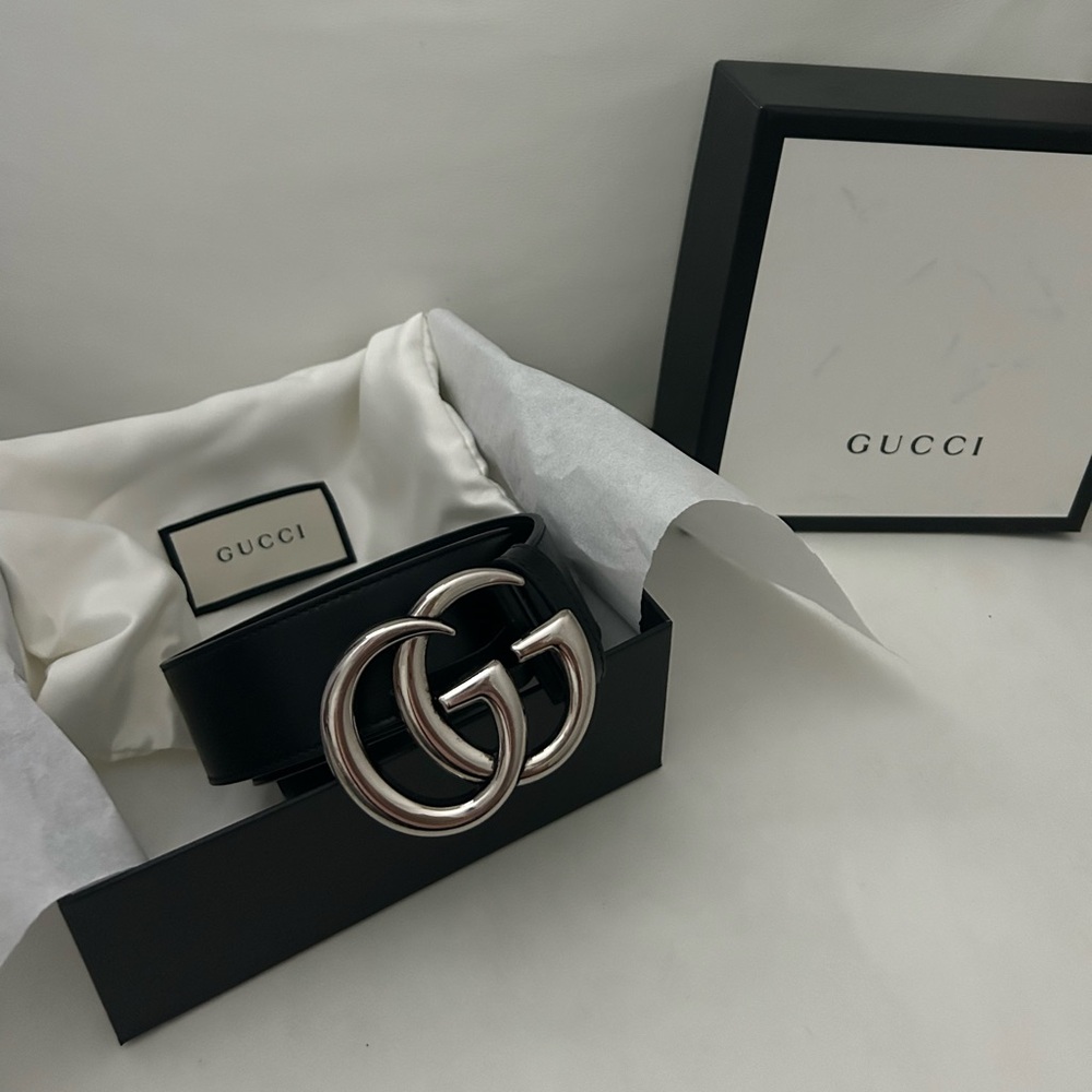 Authentic GUCCI black belt.  Almost BRAND NEW!  Worn maybe 5-6 times.  Lost lbs